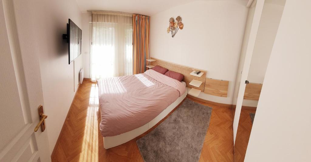 Voodi või voodid majutusasutuse Cozy room in Paris LaDefense toas