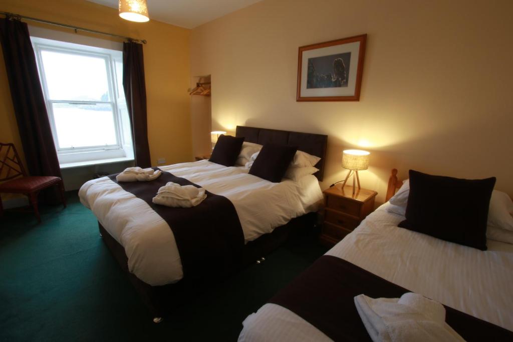 Postel nebo postele na pokoji v ubytování Inn at Ardgour