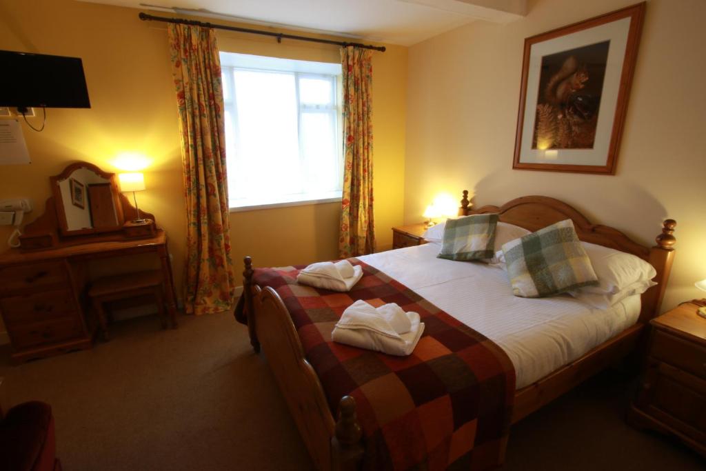 Postel nebo postele na pokoji v ubytování Inn at Ardgour