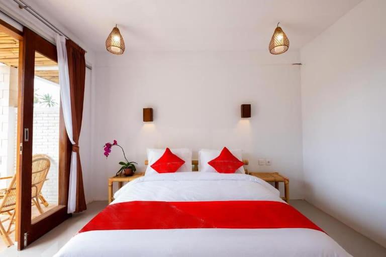 Postel nebo postele na pokoji v ubytování Surya Lombok Accommodation