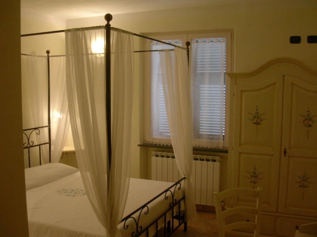Postel nebo postele na pokoji v ubytování B&B Oasi Verde