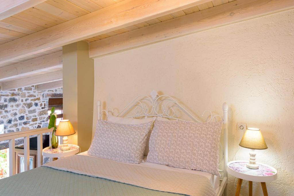Posteľ alebo postele v izbe v ubytovaní Platipodi stone house