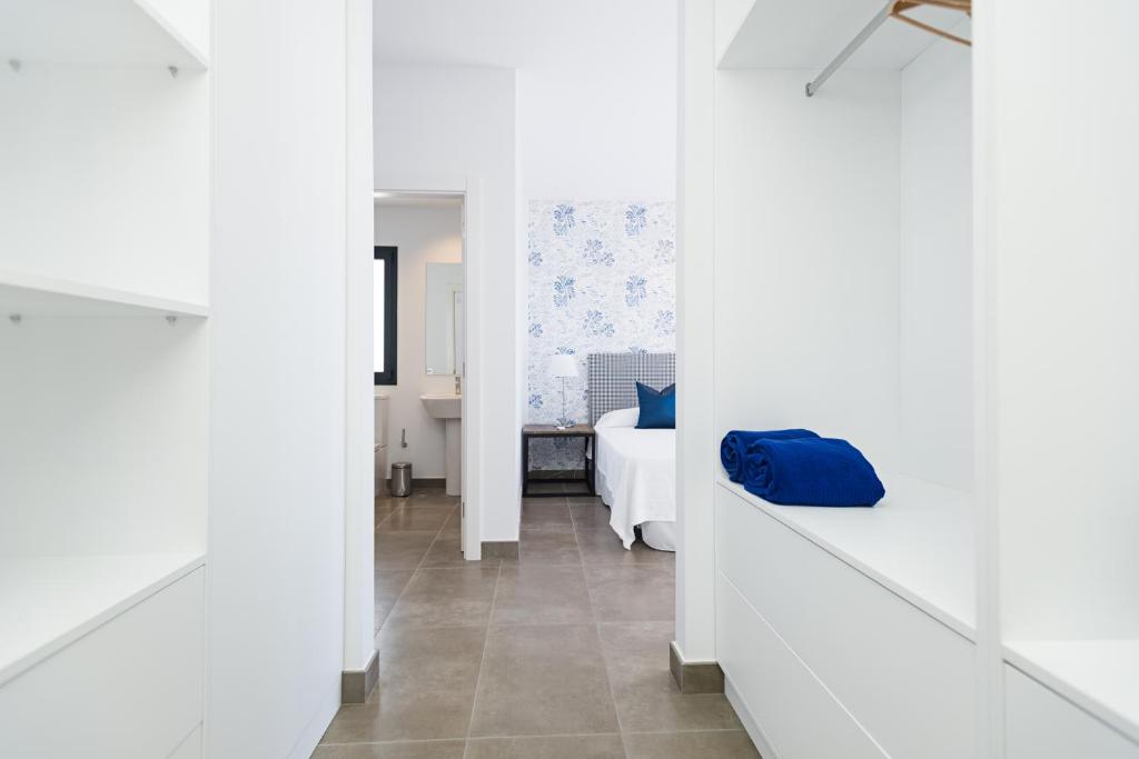 Postel nebo postele na pokoji v ubytování Altos de la Gloria Beach Apartments