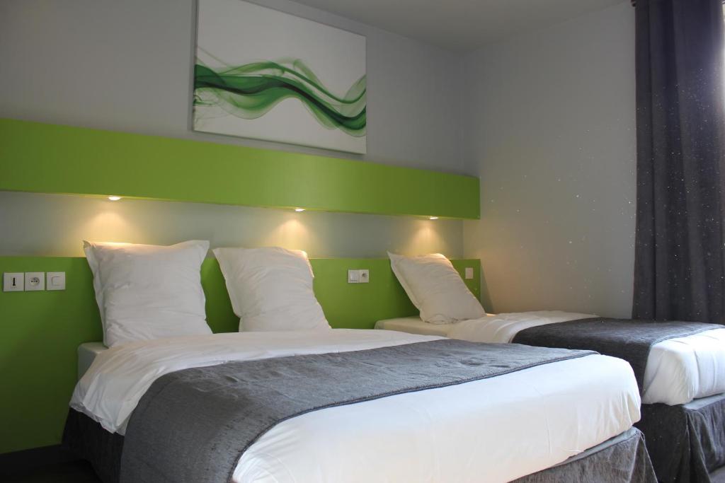 Postel nebo postele na pokoji v ubytování Hotel Esplanade