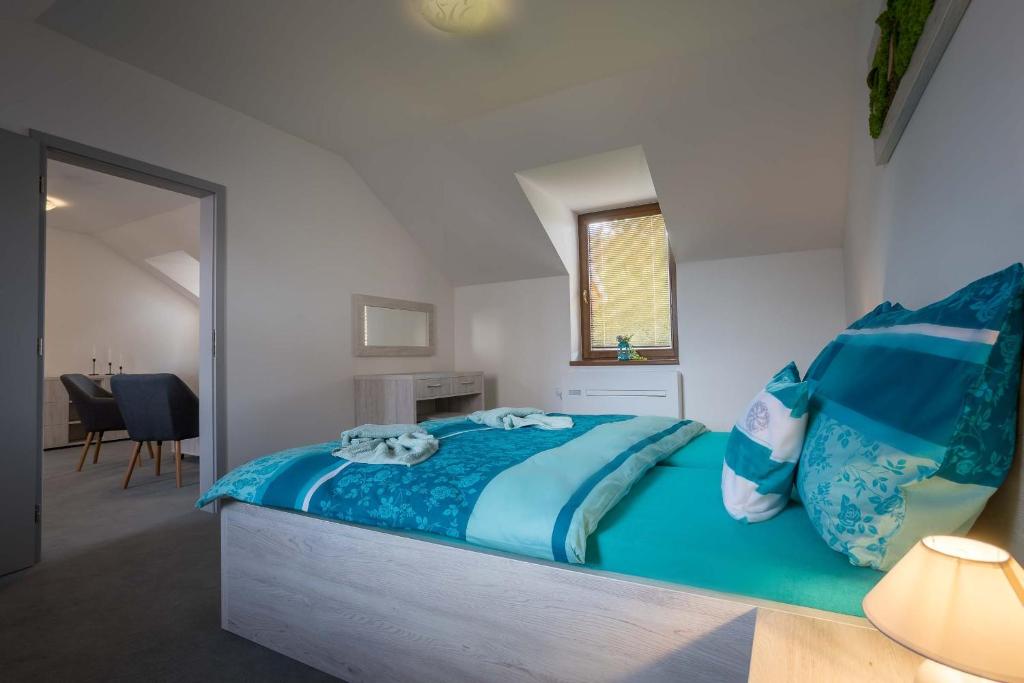 Postel nebo postele na pokoji v ubytování Hotel U Nádraží