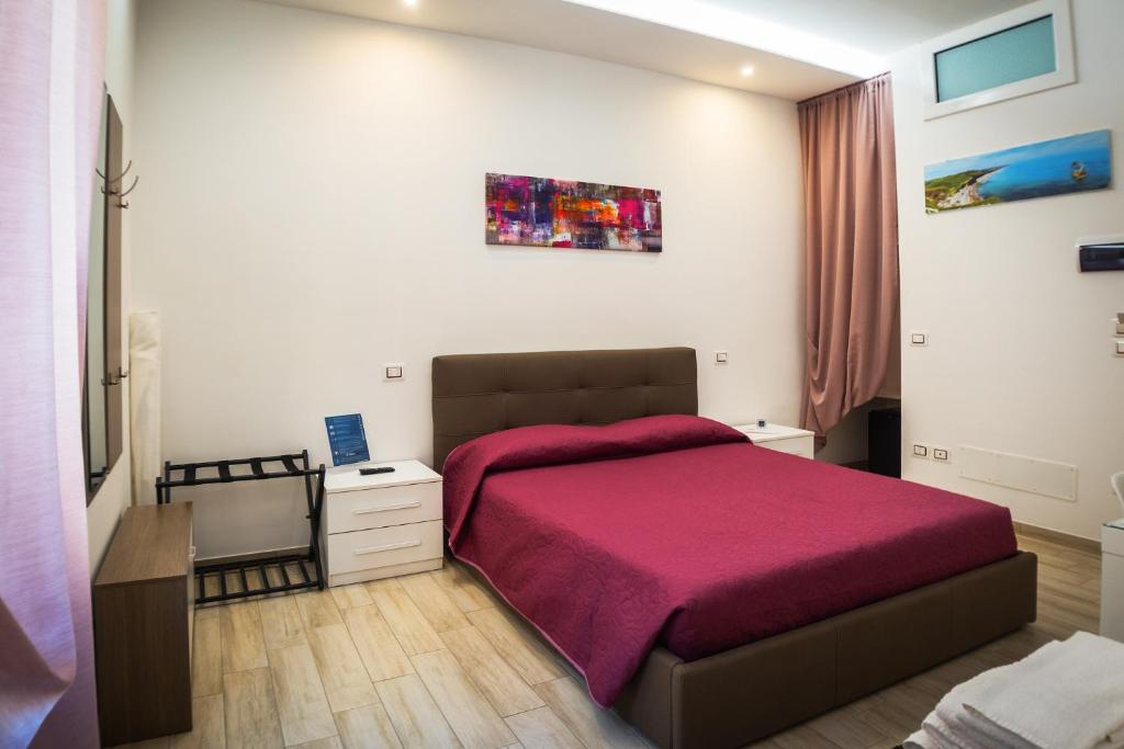 Postel nebo postele na pokoji v ubytování Dimora Del Vasto