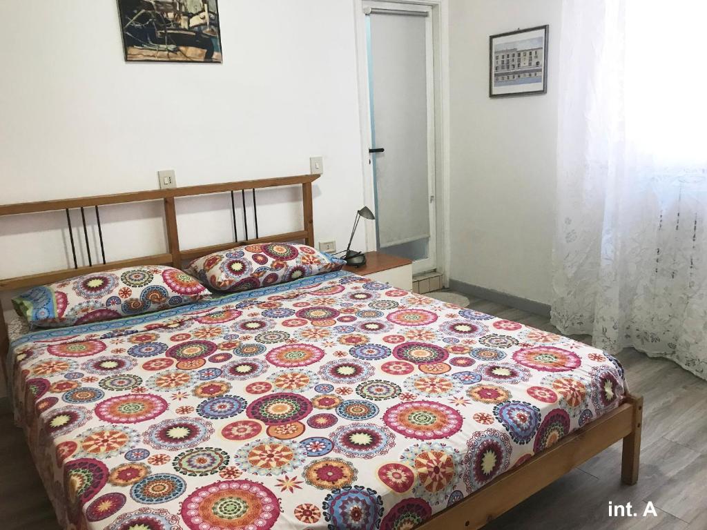 Postel nebo postele na pokoji v ubytování App Bilocale Gatteo Mare