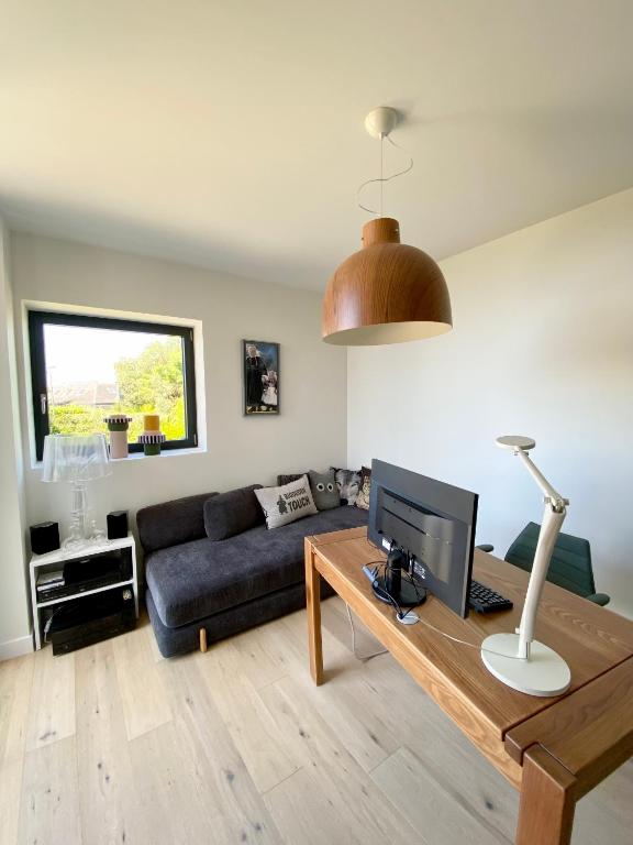 Posezení v ubytování Superbe villa vue sur mer, corniche de la plage