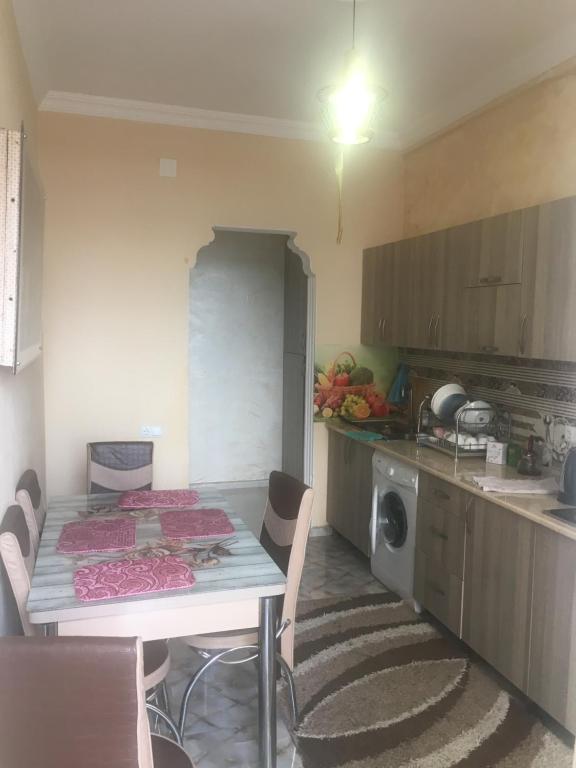Kuchyň nebo kuchyňský kout v ubytování Guest House Kakha