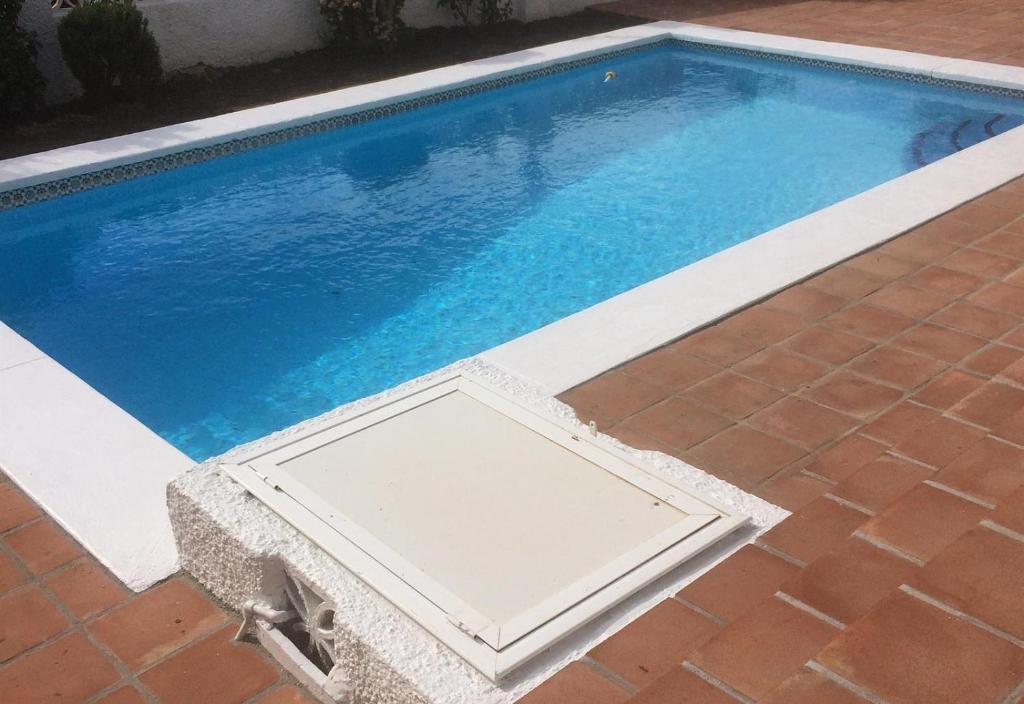 Bazén v ubytovaní Andalusian style villa alebo v jeho blízkosti