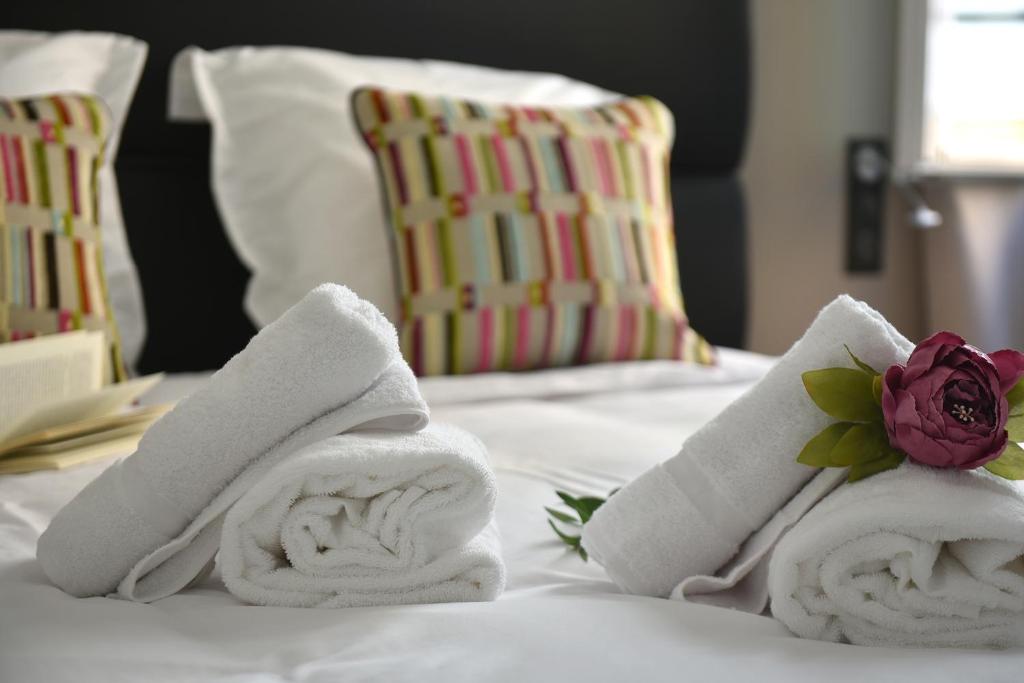 Posteľ alebo postele v izbe v ubytovaní Hôtel Continental