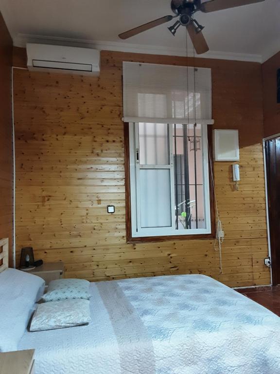 Postel nebo postele na pokoji v ubytování La Cabaña