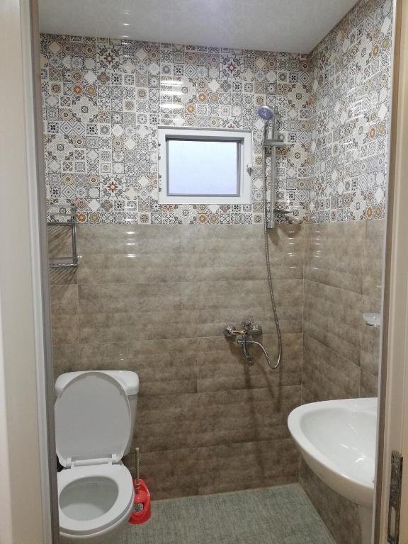 Koupelna v ubytování Hotel Kvadrati