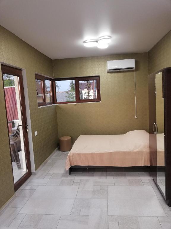 Postel nebo postele na pokoji v ubytování Hotel Kvadrati