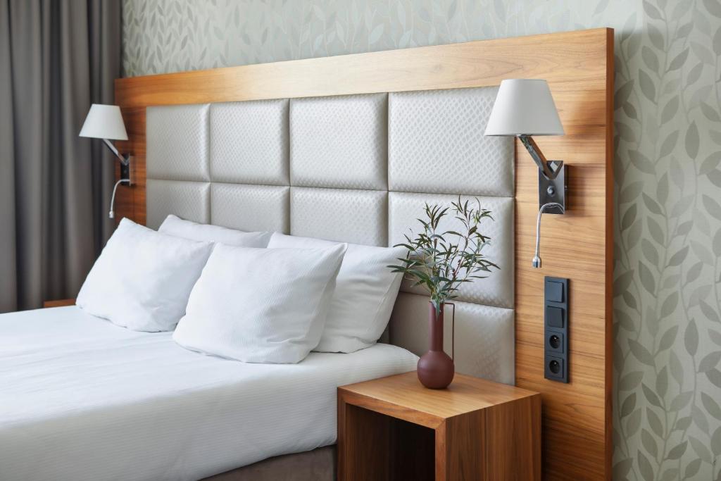 Postel nebo postele na pokoji v ubytování Sea Premium Apartments - Destigo Hotels