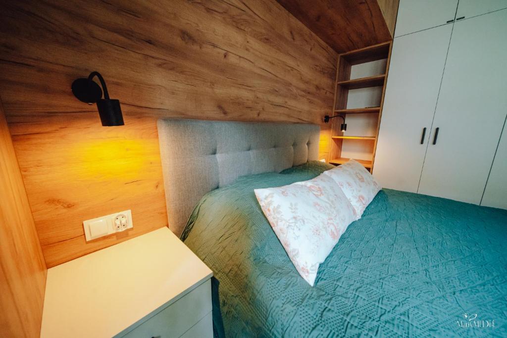 Posteľ alebo postele v izbe v ubytovaní Apartament Silence Karpatia Resort Turkus