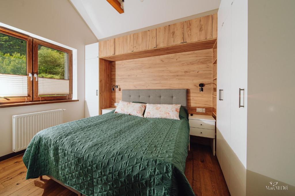 Posteľ alebo postele v izbe v ubytovaní Apartament Silence Karpatia Resort Turkus