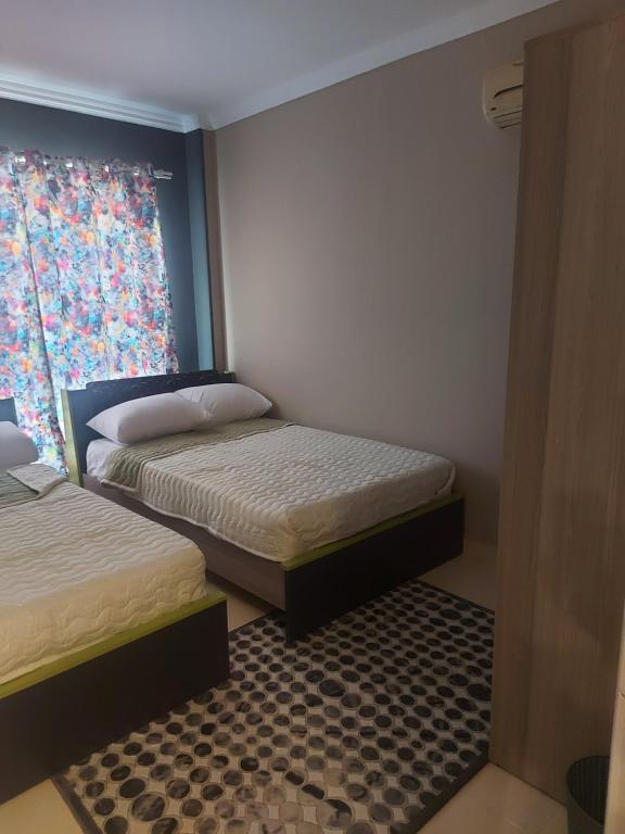 Postel nebo postele na pokoji v ubytování Trendy House