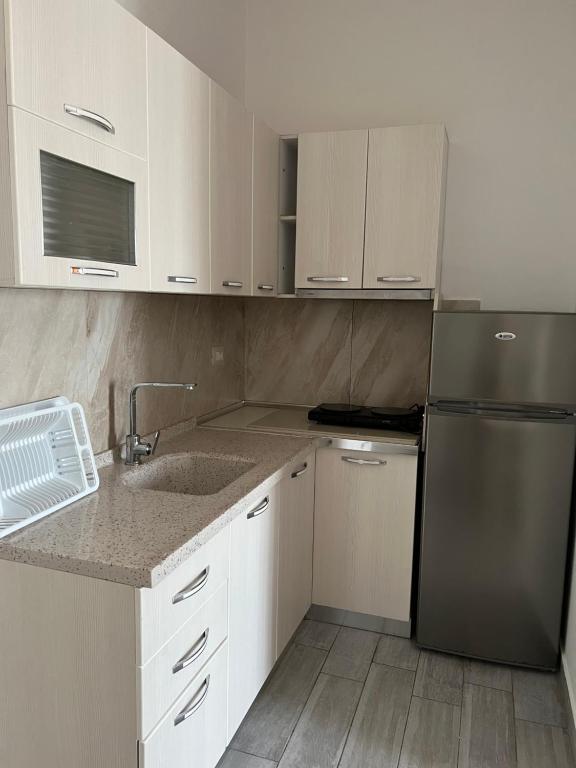 Kuchyň nebo kuchyňský kout v ubytování Bianca Apartments