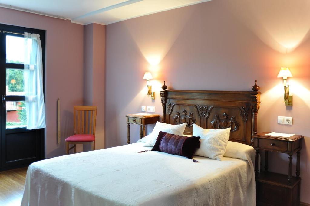 Cama o camas de una habitación en La Casona de la Roza