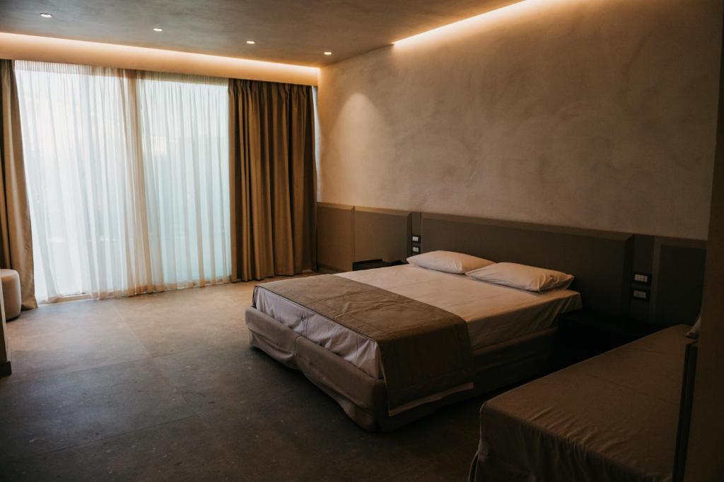 Postel nebo postele na pokoji v ubytování Elite Bay Hotel Lalez Durres