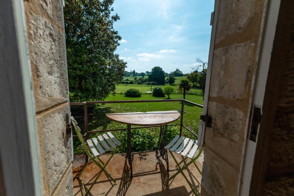 Zahrada ubytování Suite campagnarde près Bordeaux, vue sur les vignes au Château Camponac