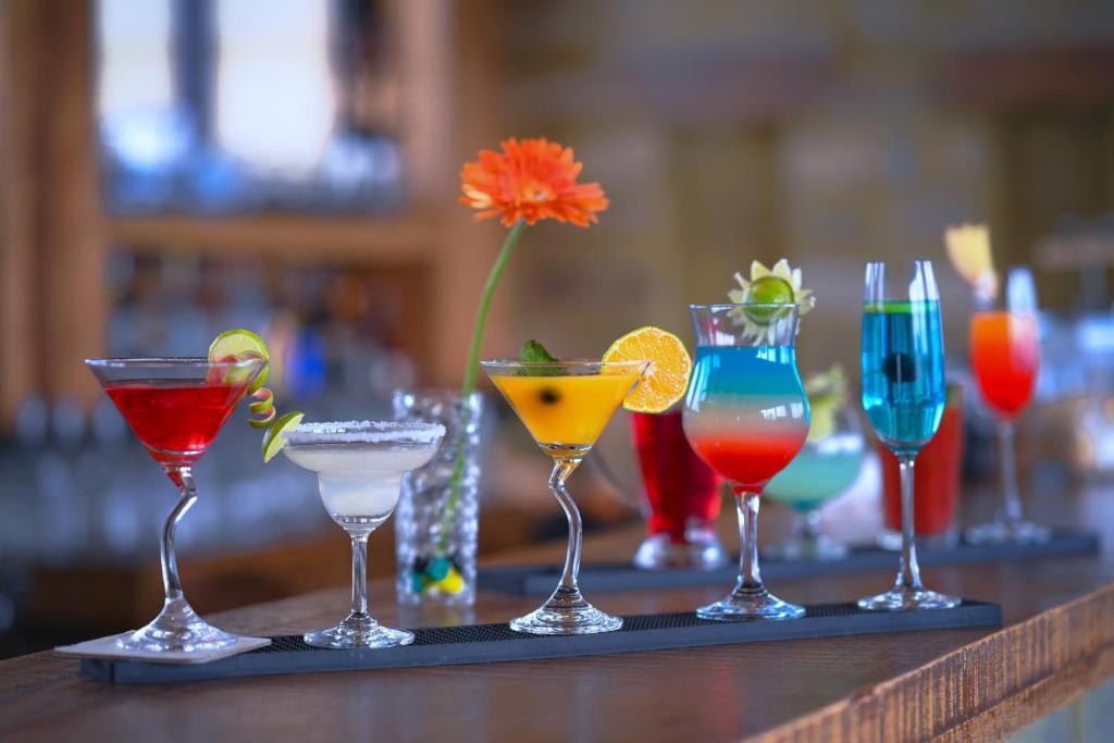 a group of different types of drinks on a table at Sarangkot Mountain Lodge in Pokhara