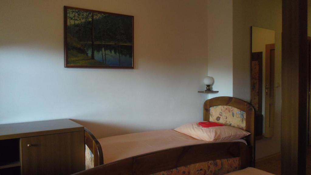 Postel nebo postele na pokoji v ubytování Pension Karolína