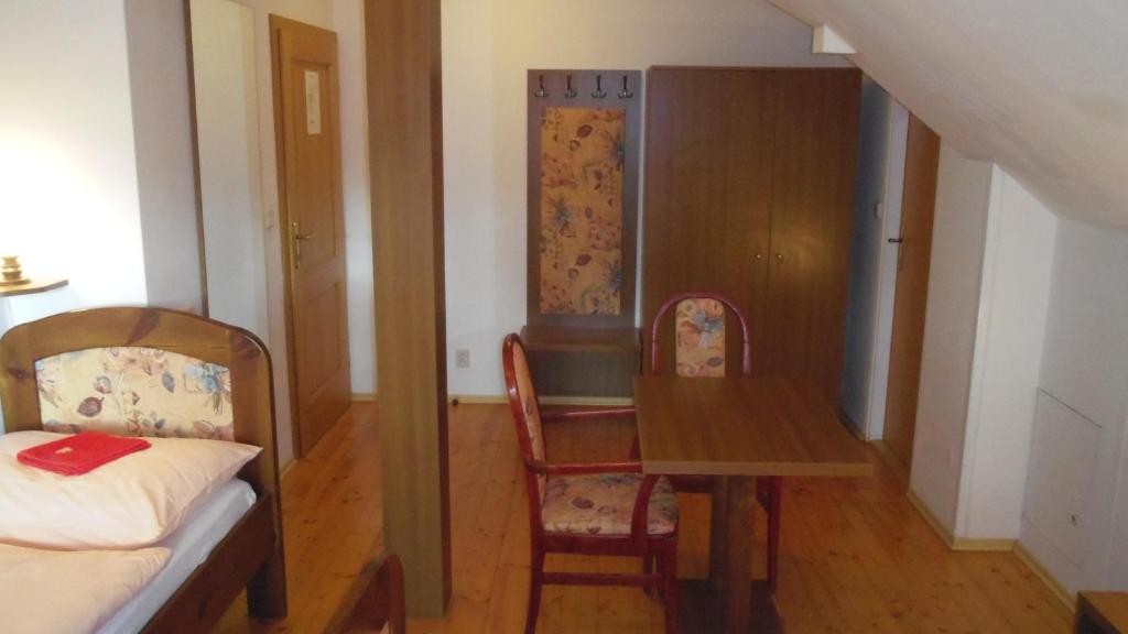 Postel nebo postele na pokoji v ubytování Pension Karolína