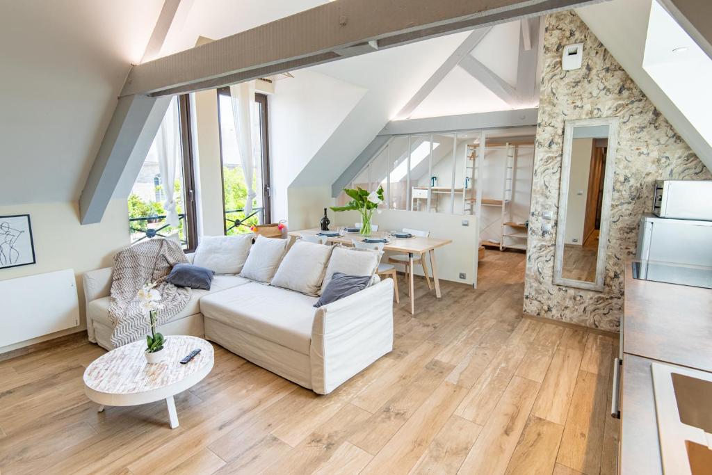 O zonă de relaxare la Loft cosy et lumineux, centre bourg par Groom*