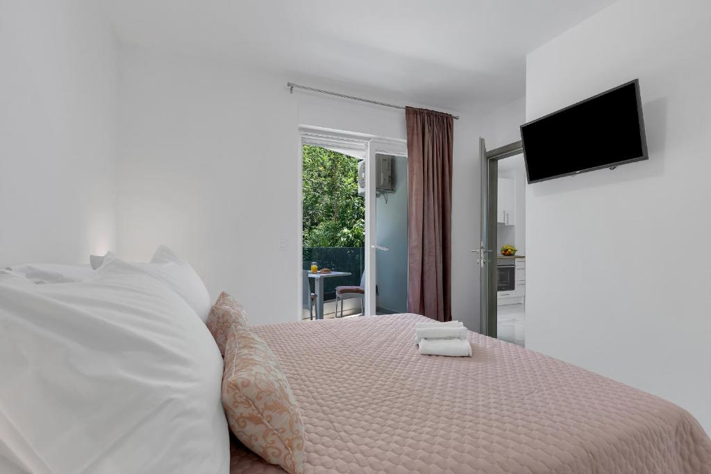 Posteľ alebo postele v izbe v ubytovaní Central Makarska - Apartments Šantrić