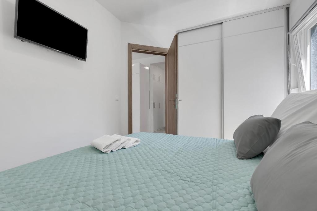 Posteľ alebo postele v izbe v ubytovaní Central Makarska - Apartments Šantrić