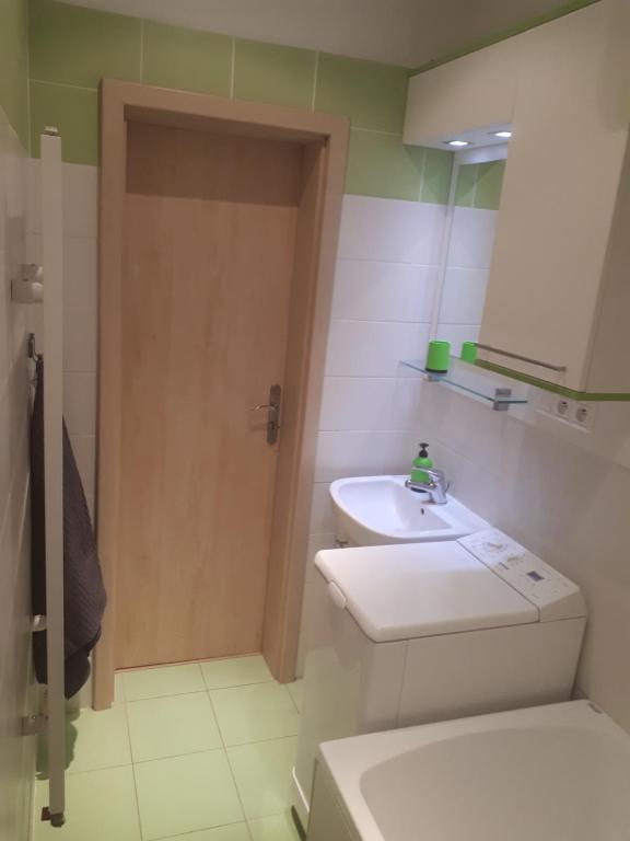 Kúpeľňa v ubytovaní Apartman Michaela