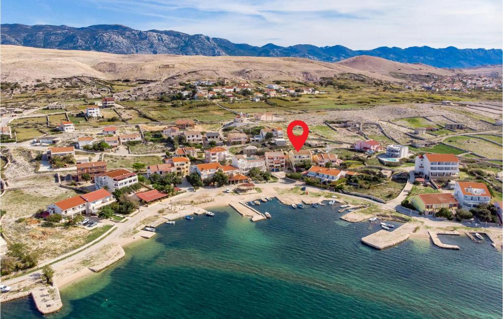 an aerial view of a resort with a red marker at 3 Bedroom Stunning Apartment In Kustici in Kustići