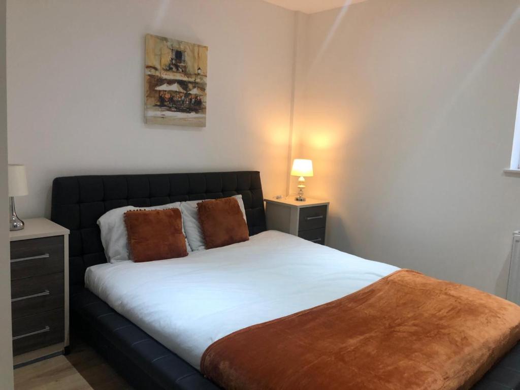 Postel nebo postele na pokoji v ubytování City Sparrow Apartments 4