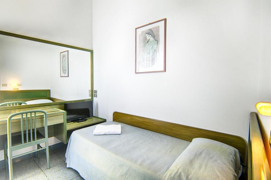 Postel nebo postele na pokoji v ubytování Hotel Gorini