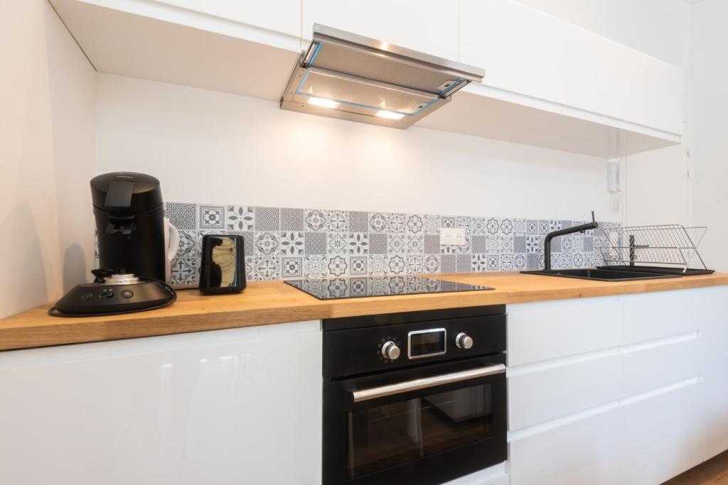 Appartements centre-ville - Wifi - Cuisine tout équipée - Lave-linge - Apartamento Estudio