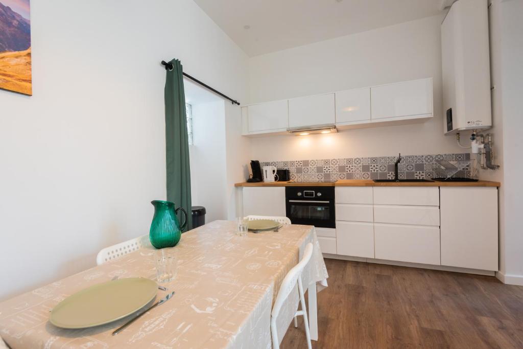 Appartements centre-ville - Wifi - Cuisine tout équipée - Lave-linge - Error
