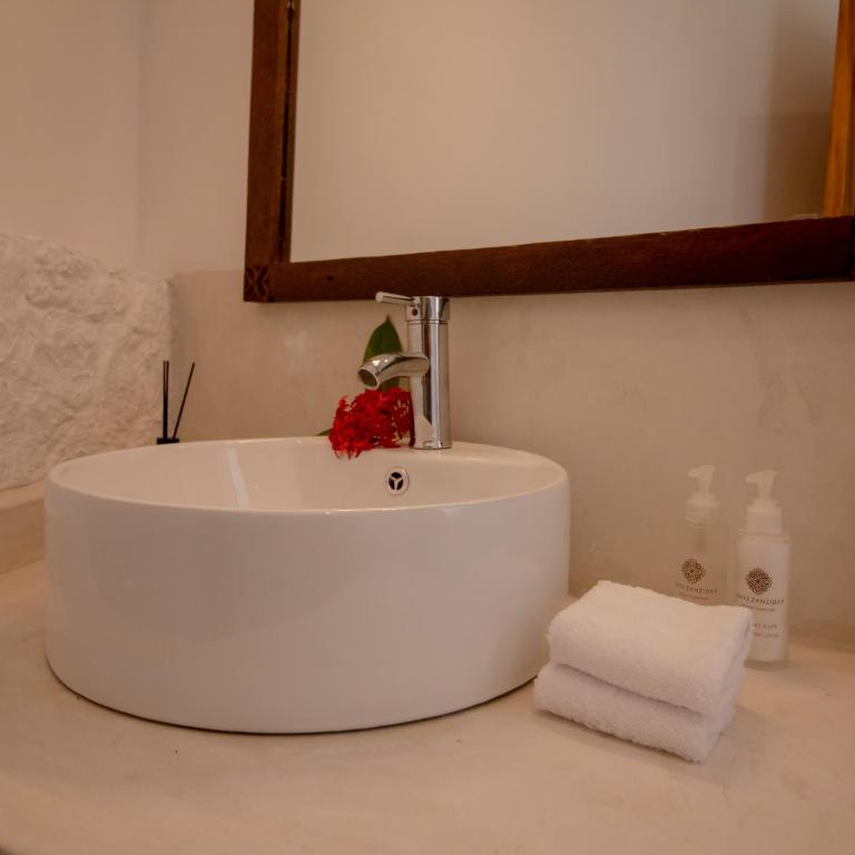 Koupelna v ubytování Tamu Tamu Boutique Hotel