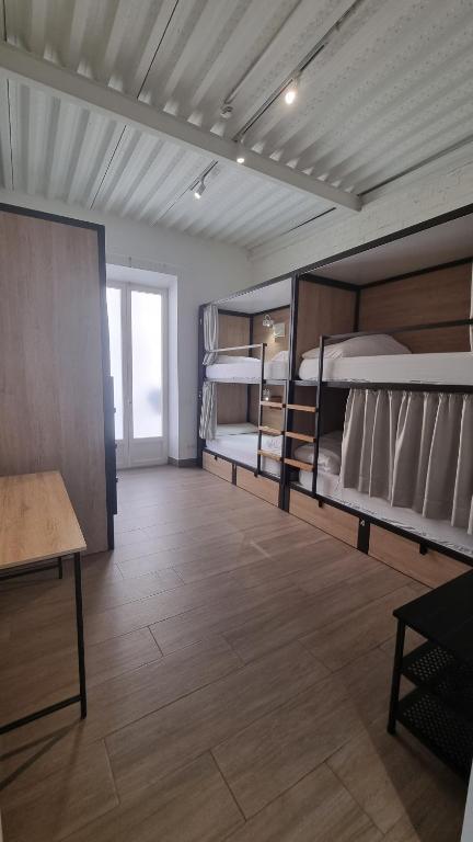 Postel nebo postele na pokoji v ubytování Hostel Nüt