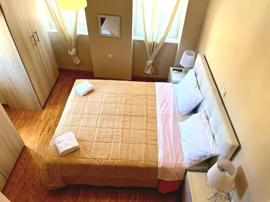 Postel nebo postele na pokoji v ubytování Vato Panoramic View Apartment