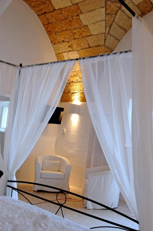 Postel nebo postele na pokoji v ubytování Holiday home La Corte dei Pirri