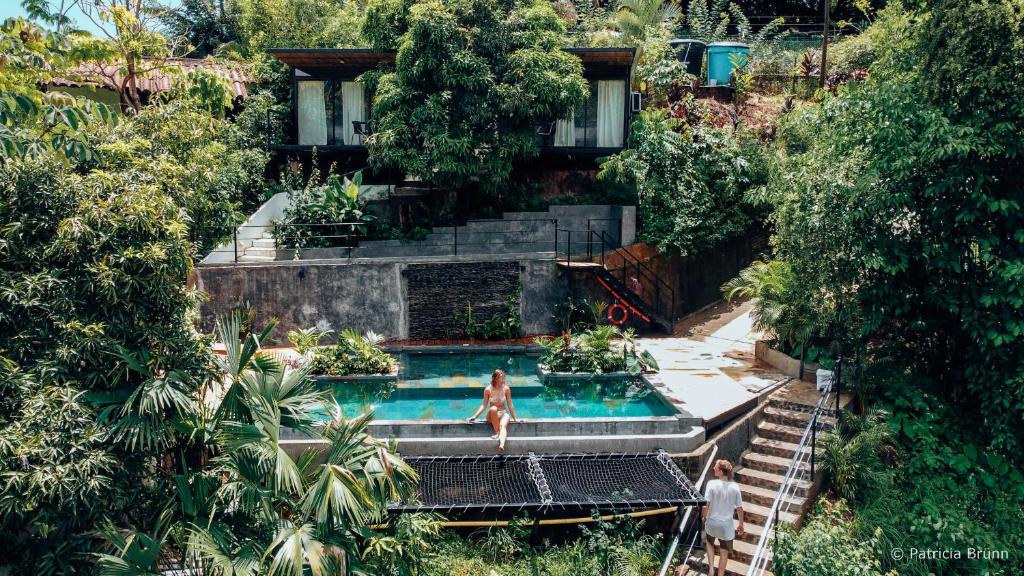 an overhead view of a swimming pool in a house at Costeño River Minca in Minca