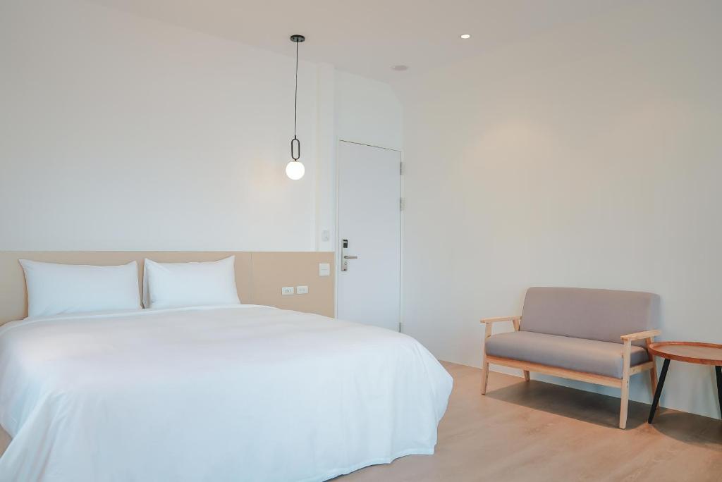 Rúm í herbergi á Bethlehem B&B Kenting