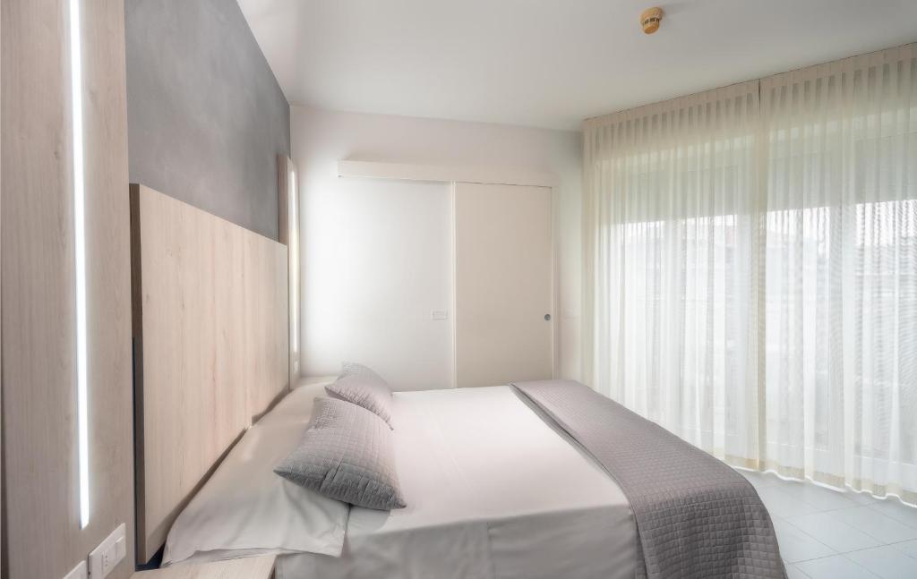 Postel nebo postele na pokoji v ubytování Hotel Marisa