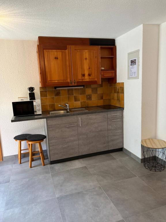 Η κουζίνα ή μικρή κουζίνα στο Au Vieux Champex