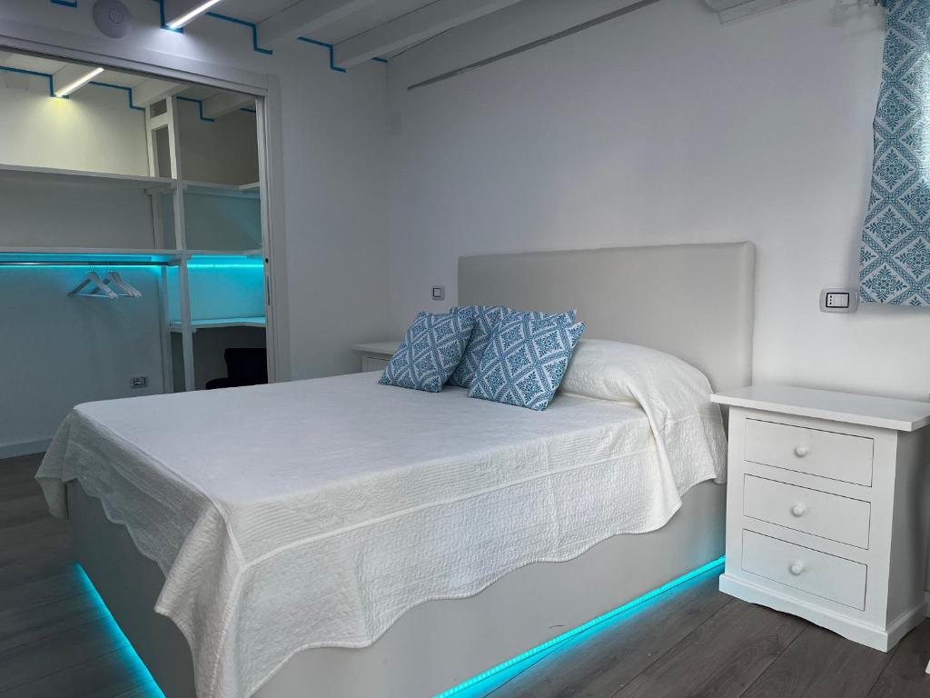 Postel nebo postele na pokoji v ubytování Palmasera Charming Rooms