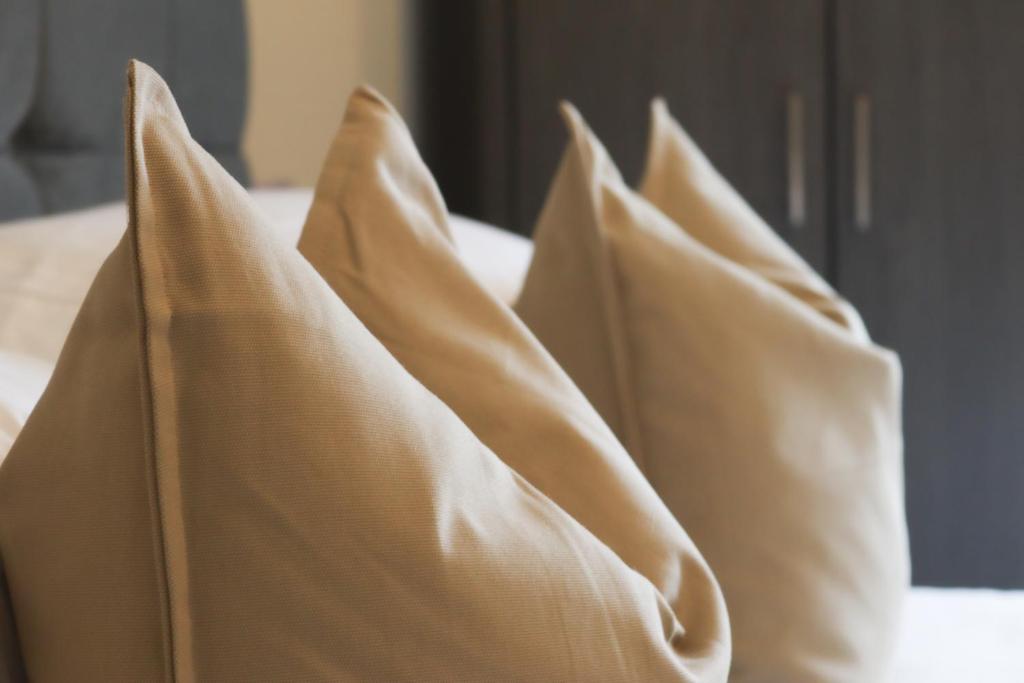 Postel nebo postele na pokoji v ubytování Cosy Ardrossan Apartment