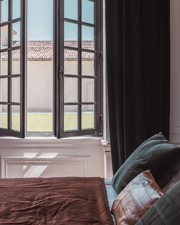 Postel nebo postele na pokoji v ubytování Château Laffitte Carcasset