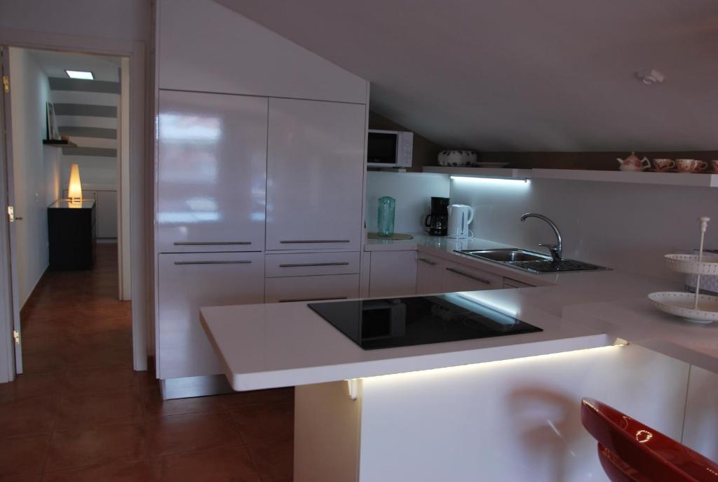Kuchyň nebo kuchyňský kout v ubytování Lacy Golf Apartments